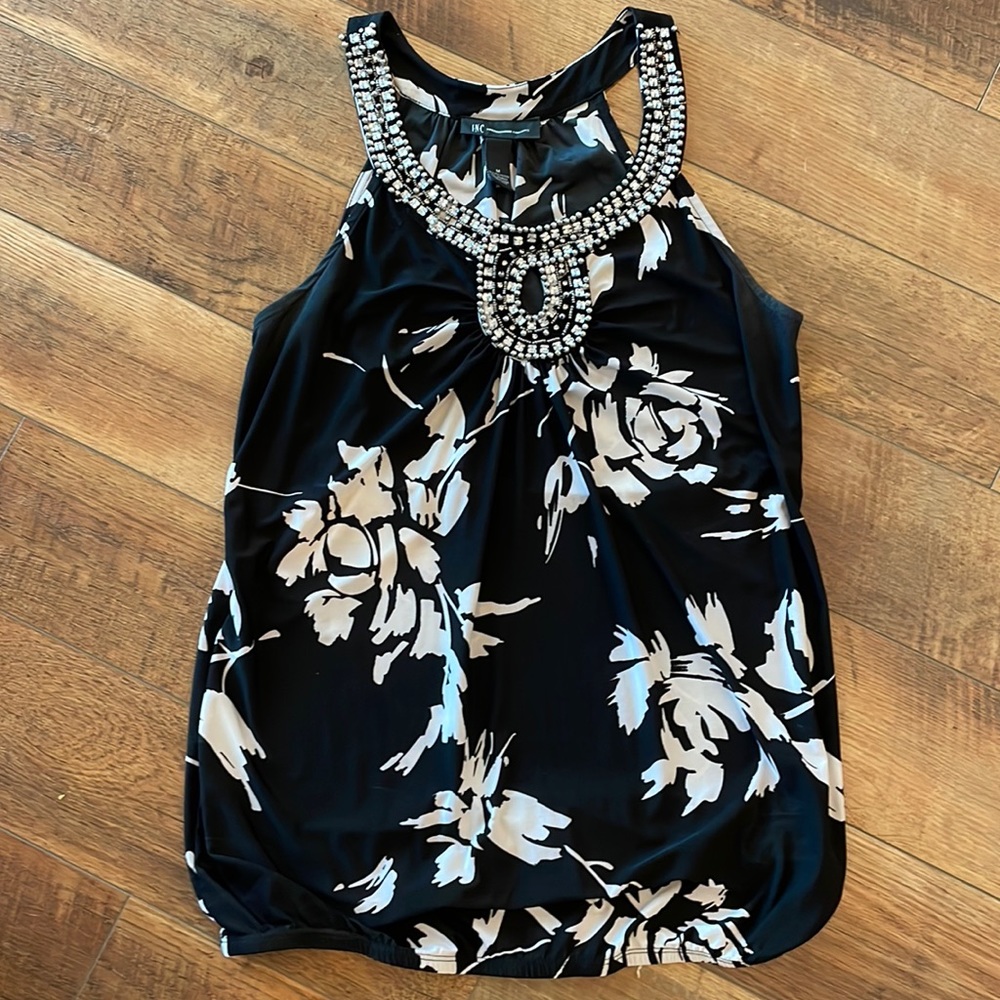 INC floral top with beaded key hole neckline.
